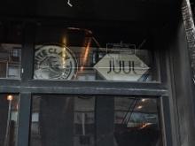 Juul and white claw signs