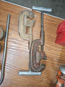 Assorted pipe cutting tools