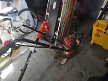 Used gas hand held ground tiller
