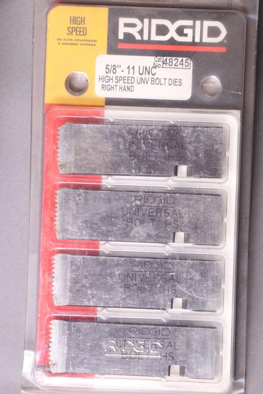 Small cardboard box of assorted replacement dies for Rigid-300 die heads