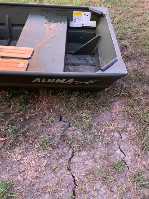 Almost new Alumacraft aluminum flat bottom boat