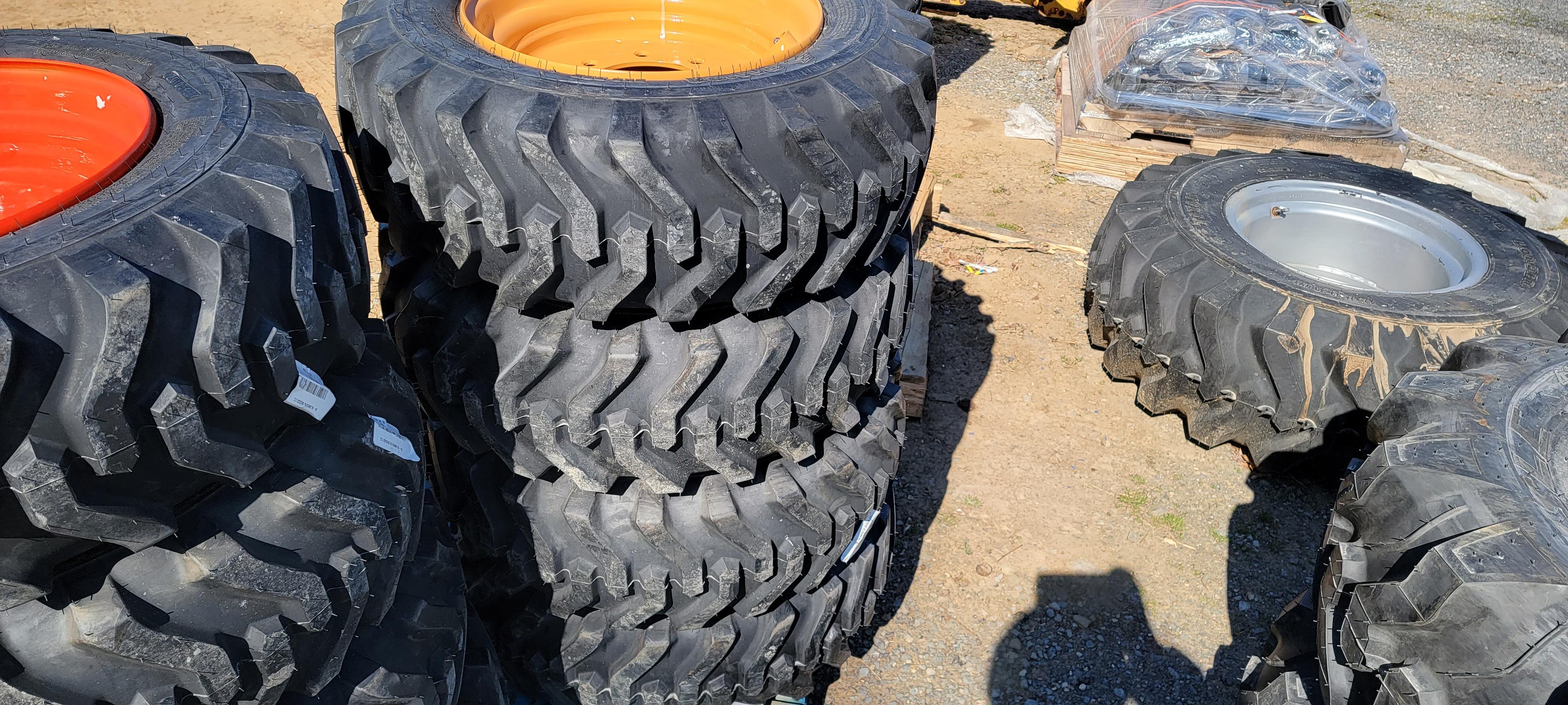 4-New 10x16.5 Skidloader Tires & Rims