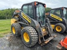 New Holland L230 skid steer with 1539 hrs ,foot controls, aux. hyd, heat & AC 4 new tires, 2 speed
