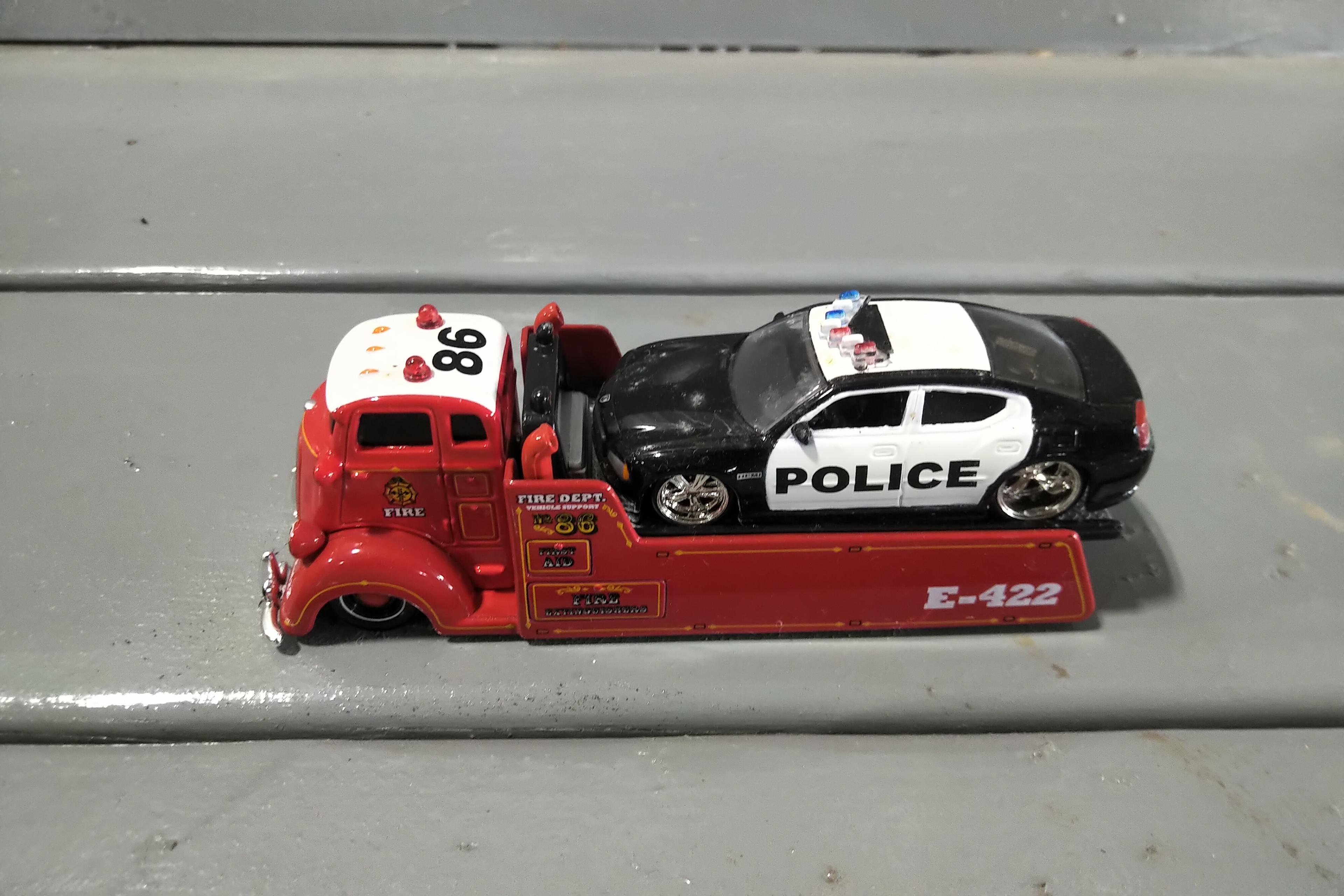 BOX OF 1/64 AND 1/32 POLICE, FIRE AND RESCUE VEHICLES