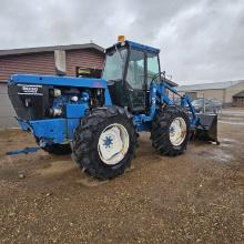 9030 Versatile-3119 hrs, new tires, loader
