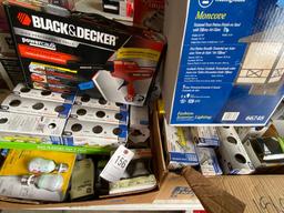 2 boxes of lights,calk gun & exterior light