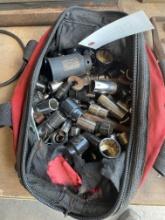 Tool Bag full of sockets and wrenches