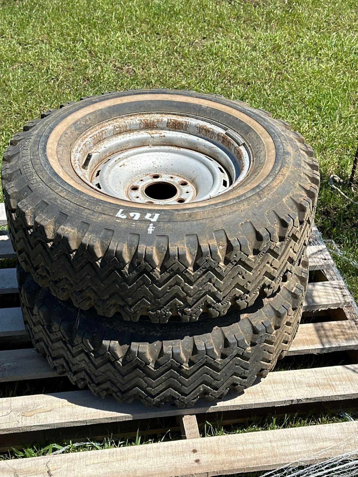 Lot of 2 L 78?15 mud and snow tires on 15 inch five hole Chevrolet rims