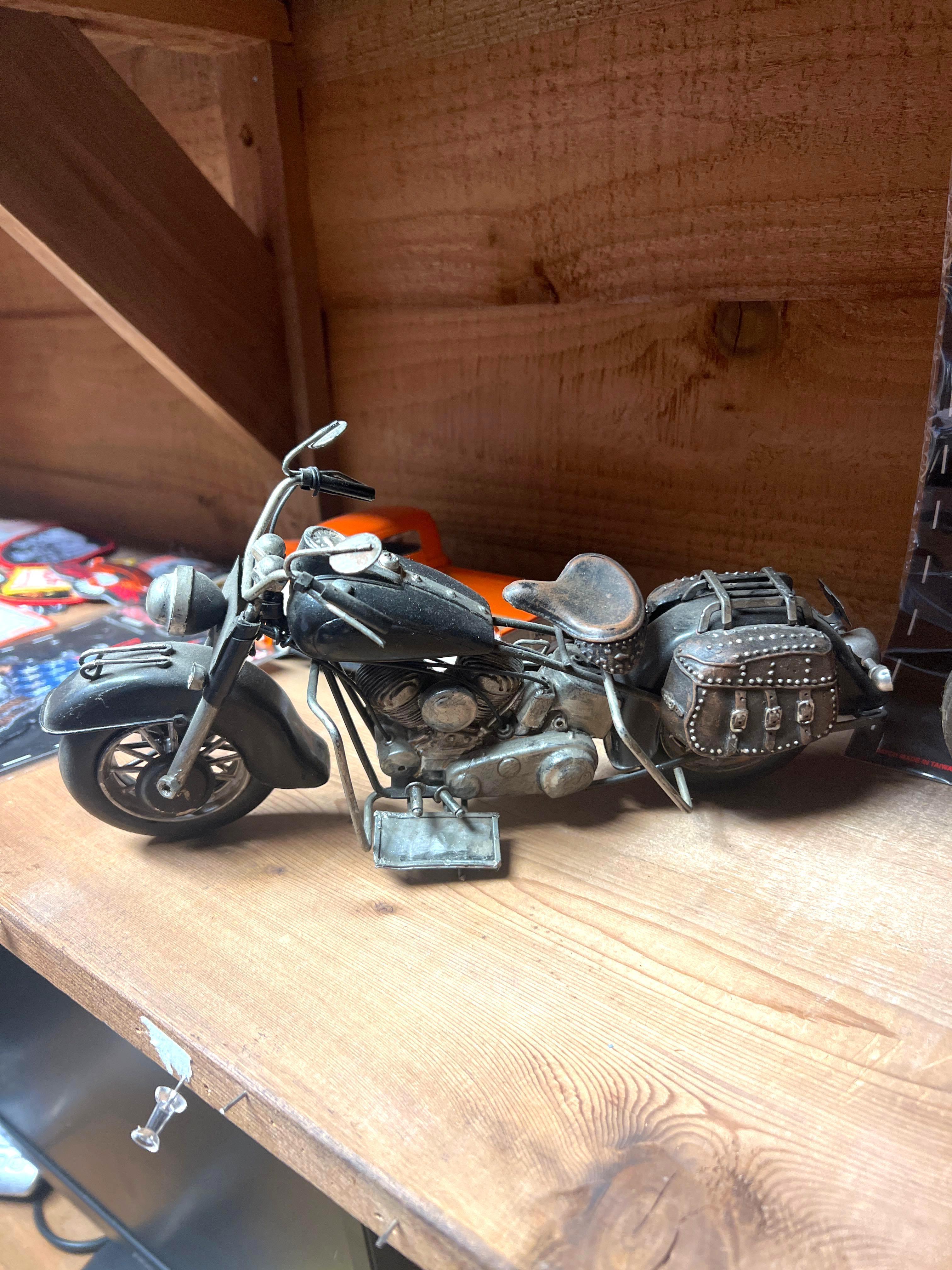 Contents of Shelf - Harley Davidson Memorabilia