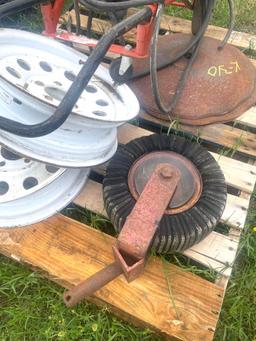 Pallet of 2 Rims, 1 Shredder Wheel, 2 Plow Discs, and Dollie