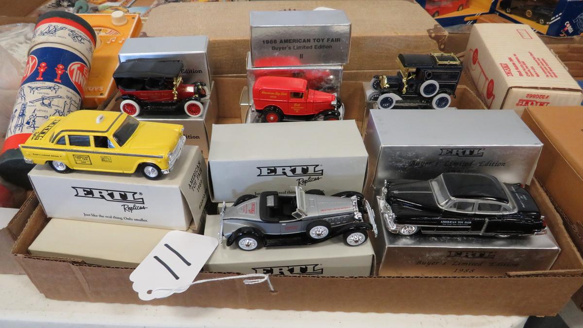 FLAT WITH 18 ERTL AMERICAN TOY FAIR DIECAST CARS