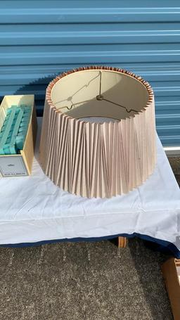 Pink bath towels Paintable plaster model and lamp shades and electric can o