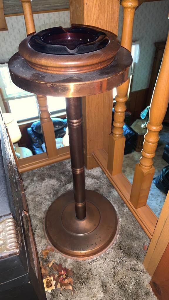 Old chest and standing ashtray