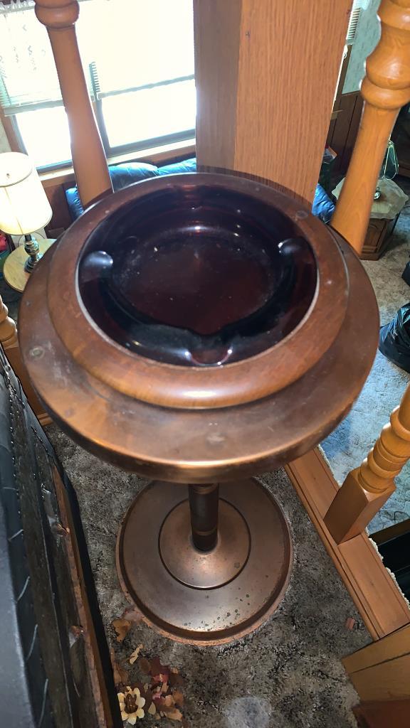 Old chest and standing ashtray