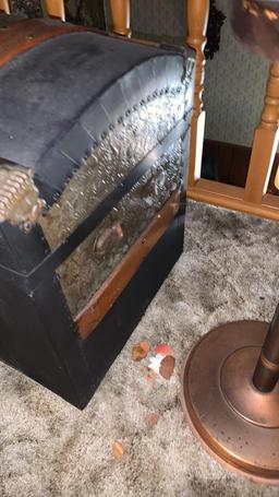 Old chest and standing ashtray