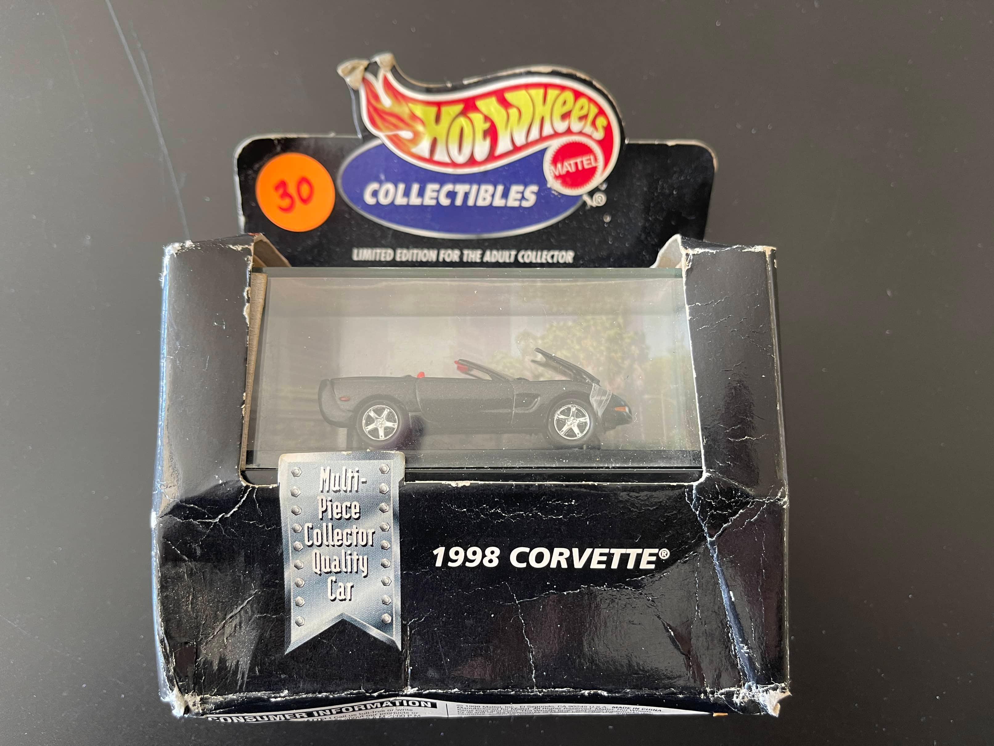 Hot Wheels on Card, Box is Crumpled but UNOPENED 98 Corvette Limited Edition With Display Case 1998