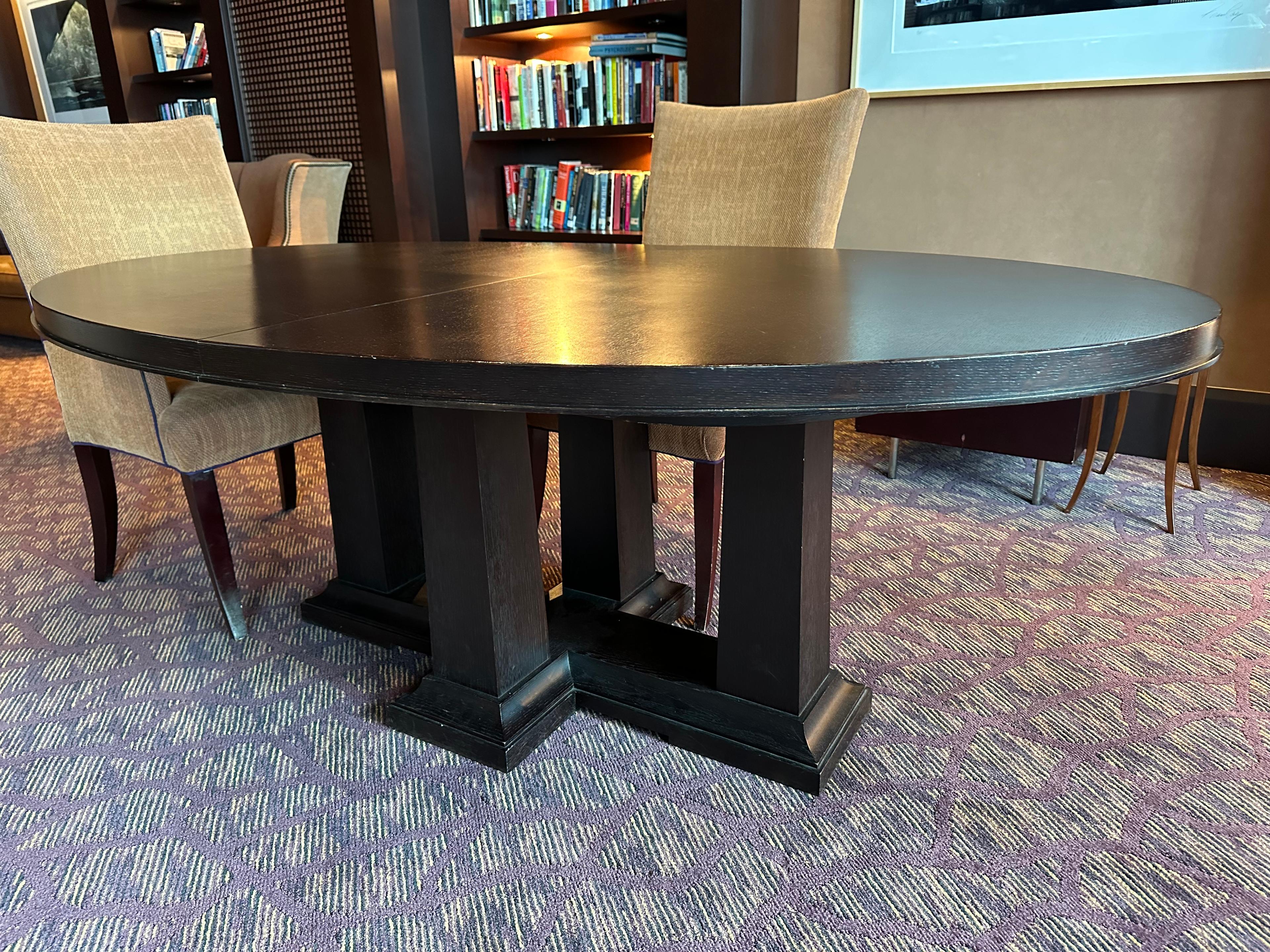 83.5"L x 49.5"W x 30.5"H Extendable Darkwood Table