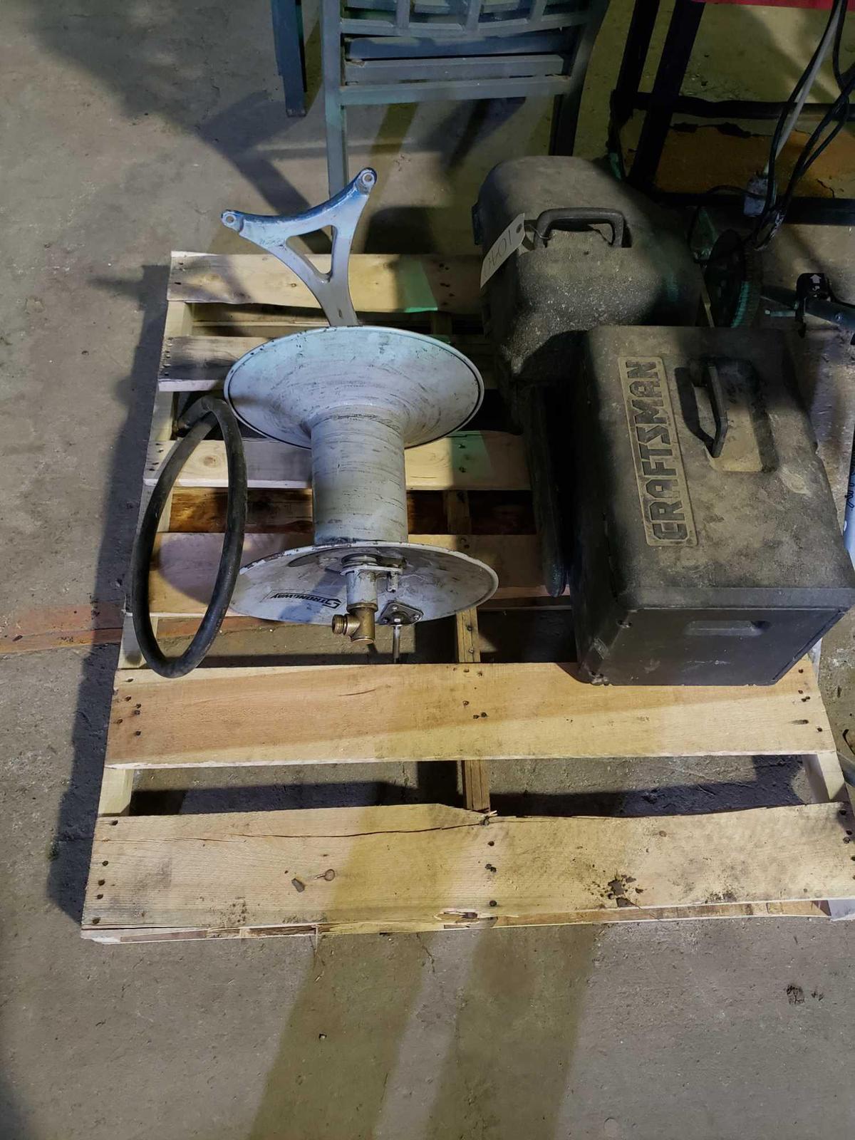 Lot of Craftsman Chainsaws and air hose reel
