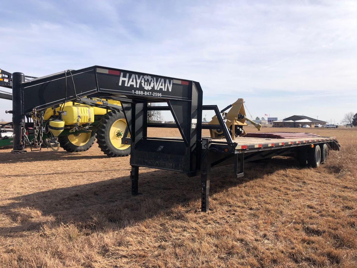 32 Ft hay van flat bed trailer with dove tail and ramps, 2 10k axels, comes with title
