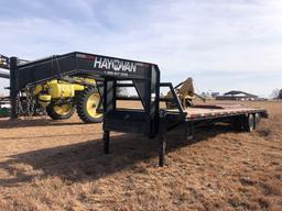 32 Ft hay van flat bed trailer with dove tail and ramps, 2 10k axels, comes with title