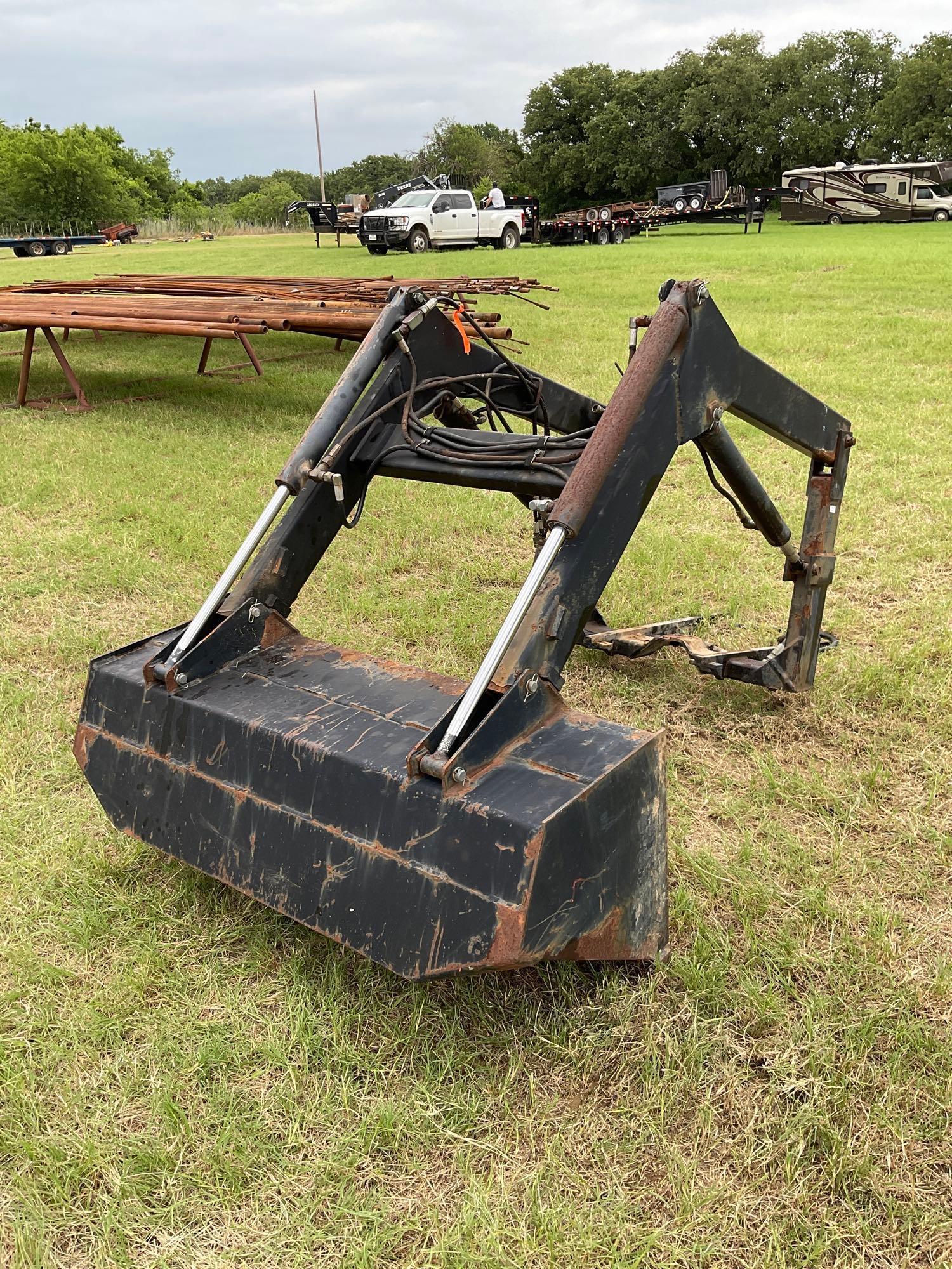 FORD 1520 WITH LOADER... DIESEL 2 WHEEL DRIVE... BUCKET WITH LOADER TURF TIRES ON THE TRACTOR REAR