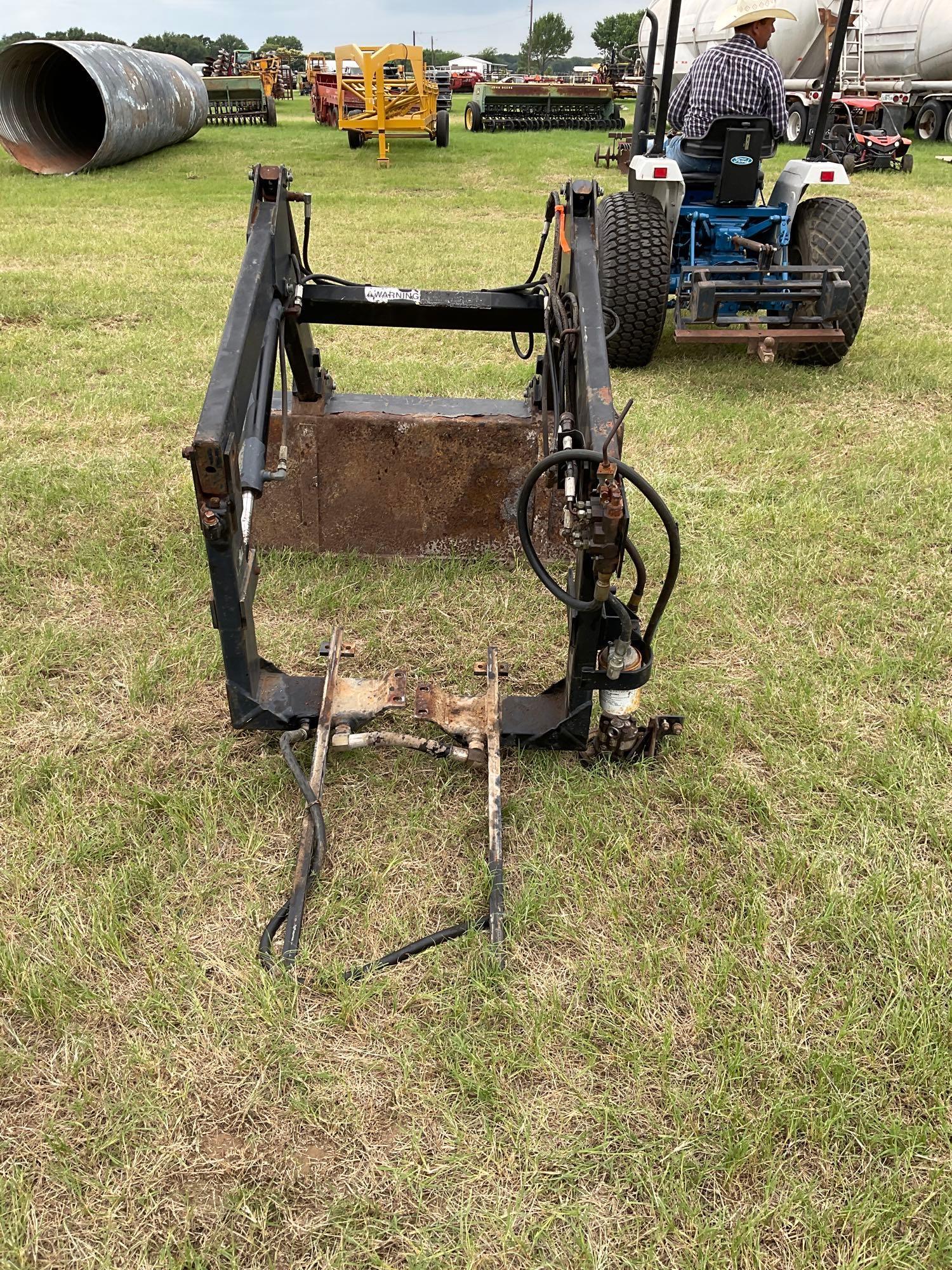 FORD 1520 WITH LOADER... DIESEL 2 WHEEL DRIVE... BUCKET WITH LOADER TURF TIRES ON THE TRACTOR REAR