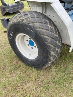 FORD 1520 WITH LOADER... DIESEL 2 WHEEL DRIVE... BUCKET WITH LOADER TURF TIRES ON THE TRACTOR REAR