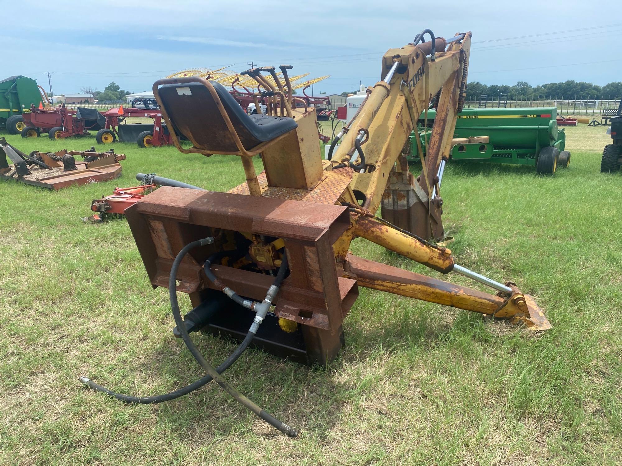 FORD BACKHOE SKID ATTACHMENT... USED ABOUT A YEAR AGO, NEEDS FITTINGS FOR HOSE CONNECTIONS... ALL SE