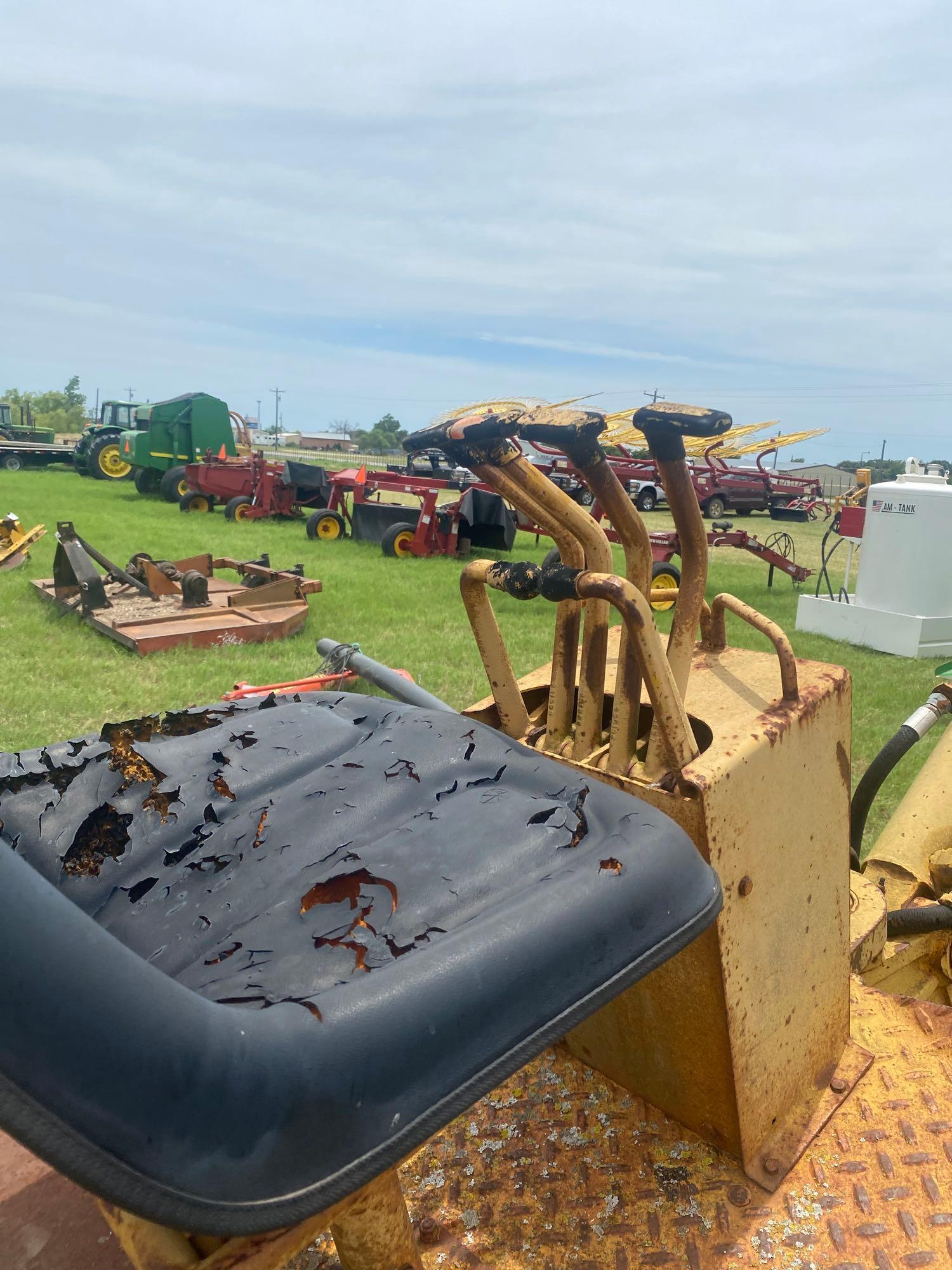 FORD BACKHOE SKID ATTACHMENT... USED ABOUT A YEAR AGO, NEEDS FITTINGS FOR HOSE CONNECTIONS... ALL SE