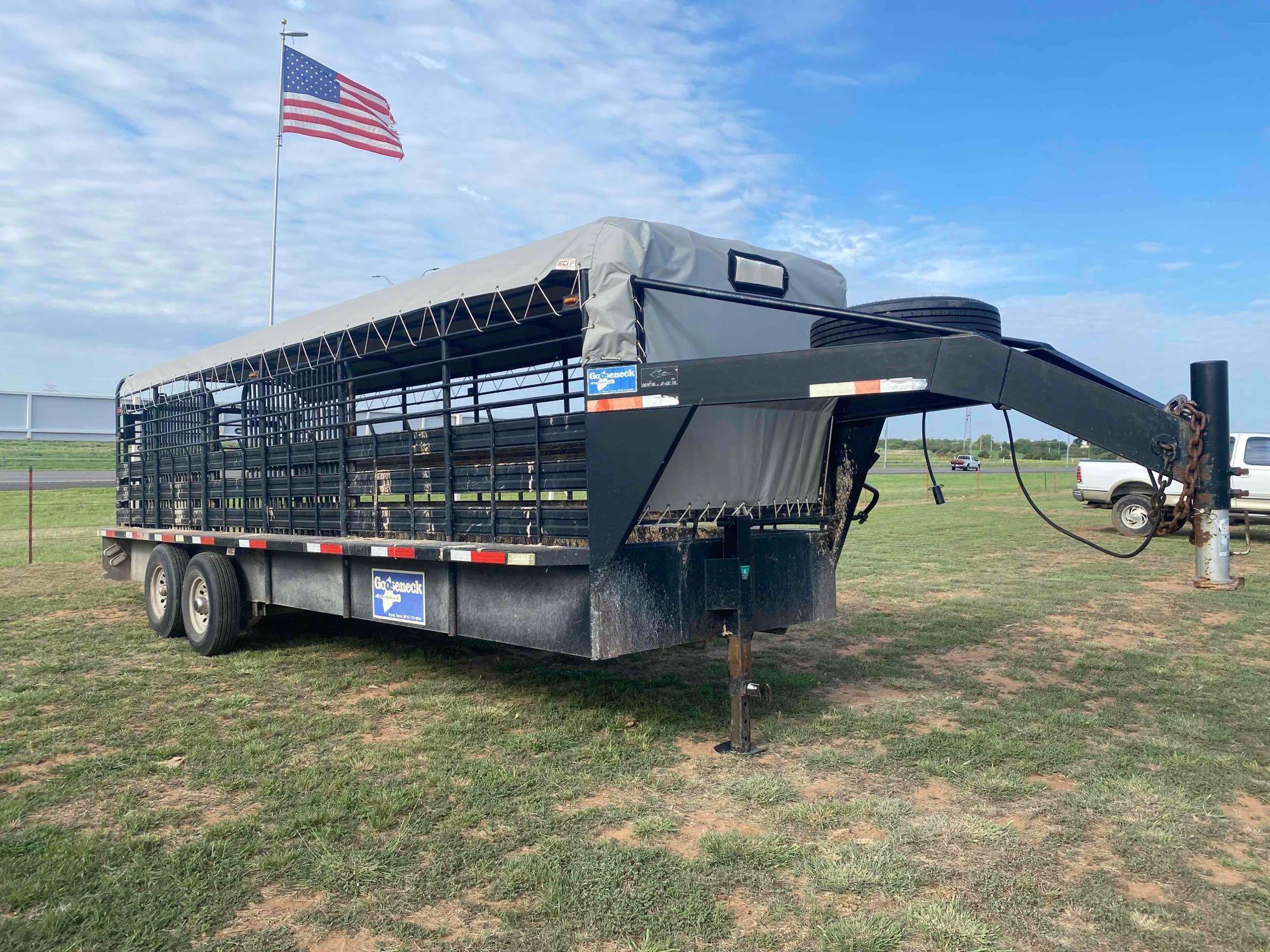 2021 24' x 6' Gooseneck Cattle Trailer, has 2... 8' Cuts, tandem axle, tires in good shape, tarp is 