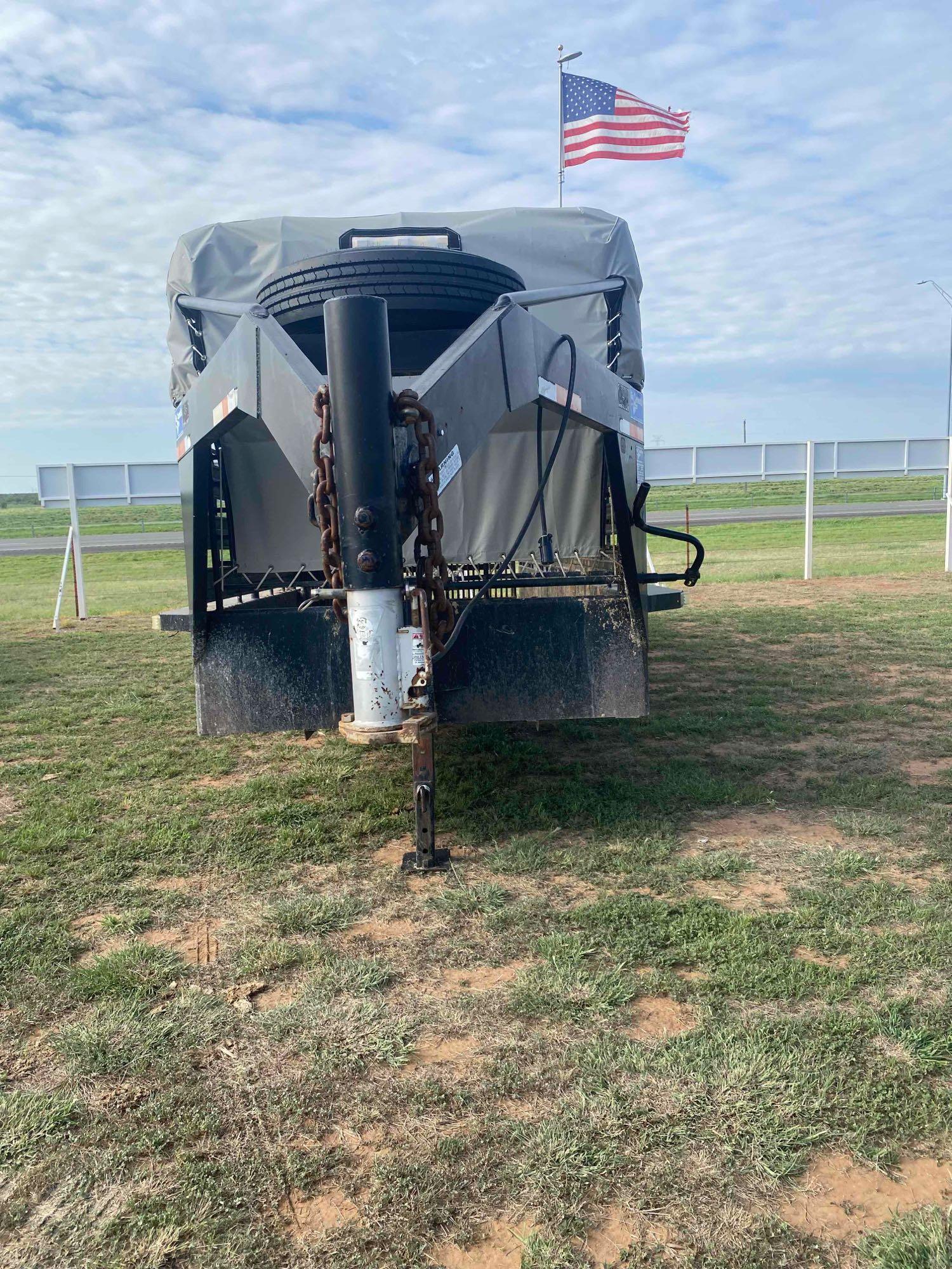 2021 24' x 6' Gooseneck Cattle Trailer, has 2... 8' Cuts, tandem axle, tires in good shape, tarp is 