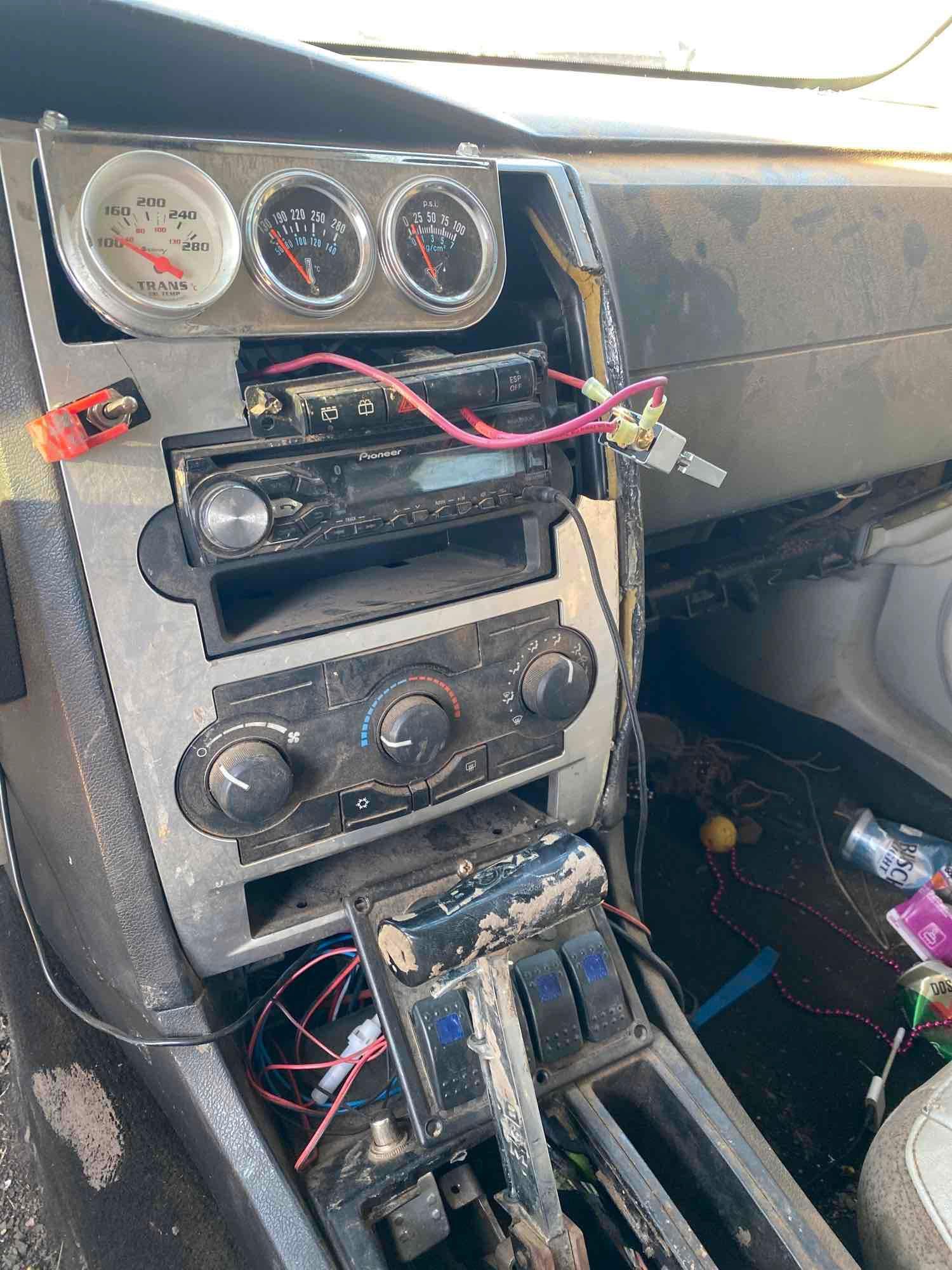 Dodge Magnum... 355 Roller Motor... Vehicle and trailer both sell with a bill of sale only...