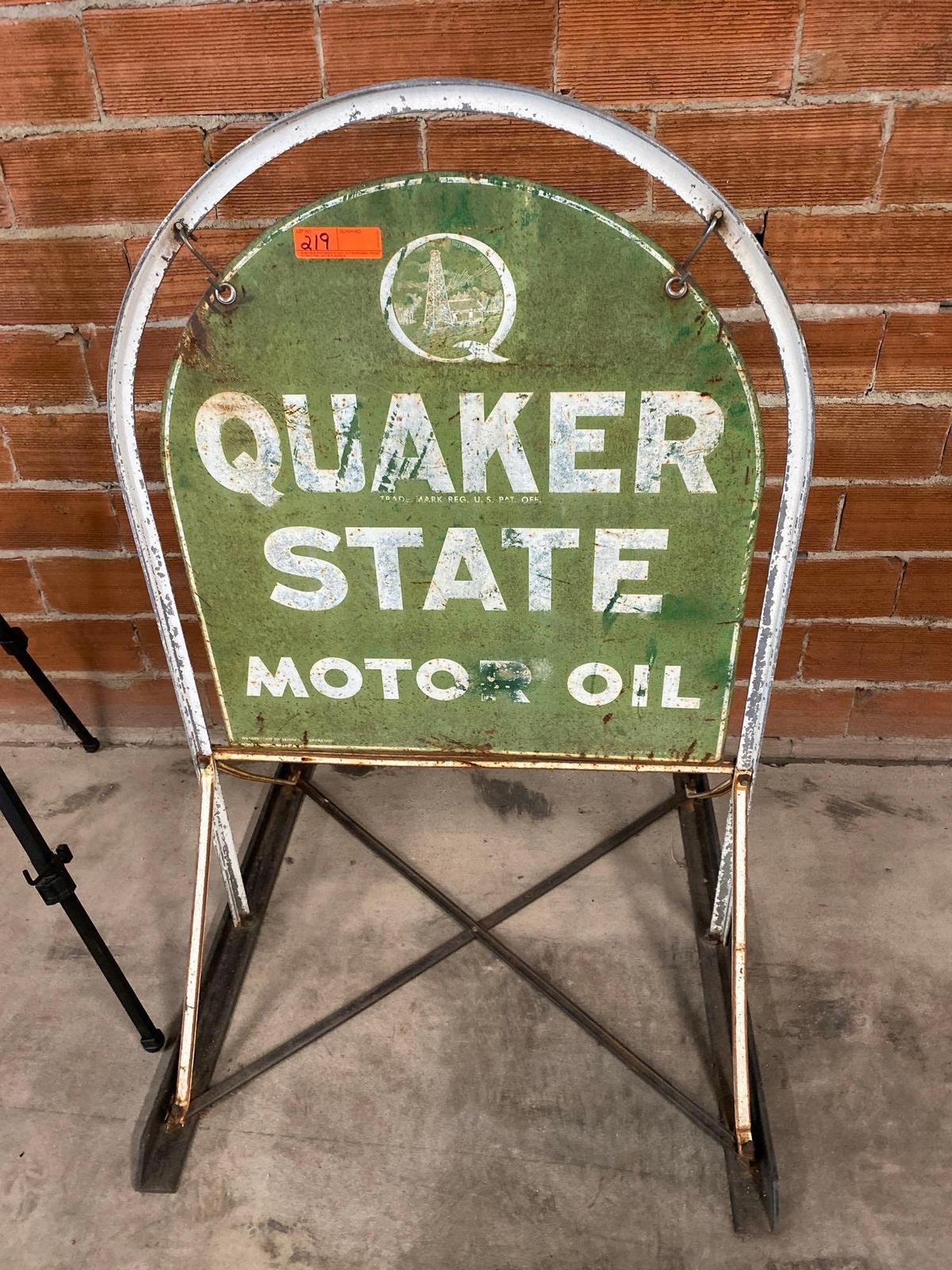 QUAKER STATE MOTOR OIL SIGN ON STAND