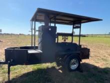 TEXAS AGGIE SMOKER ON TRAILER USED 3 TIMES GRILL OVER THE FIREBOX PROPANE RUNS THROUGH THE FIREBOX