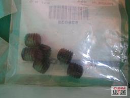 Large assortment of Case New Holland screws new in packages with part numbers. TOTE NOT INCLUDED