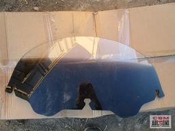 Motorcycle seat, windshield, and exhaust component