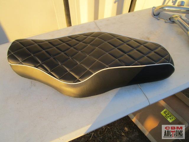 Motorcycle seat, windshield, and exhaust component