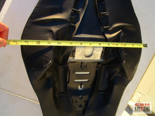 Motorcycle seat, windshield, and exhaust component