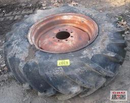 Rear tractor tire 14.9-26 on rim