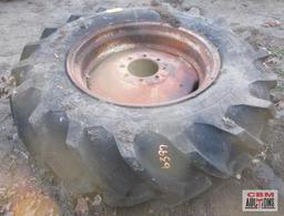 Rear tractor tire 14.9-26 on rim