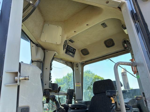 CAT 140M 2011