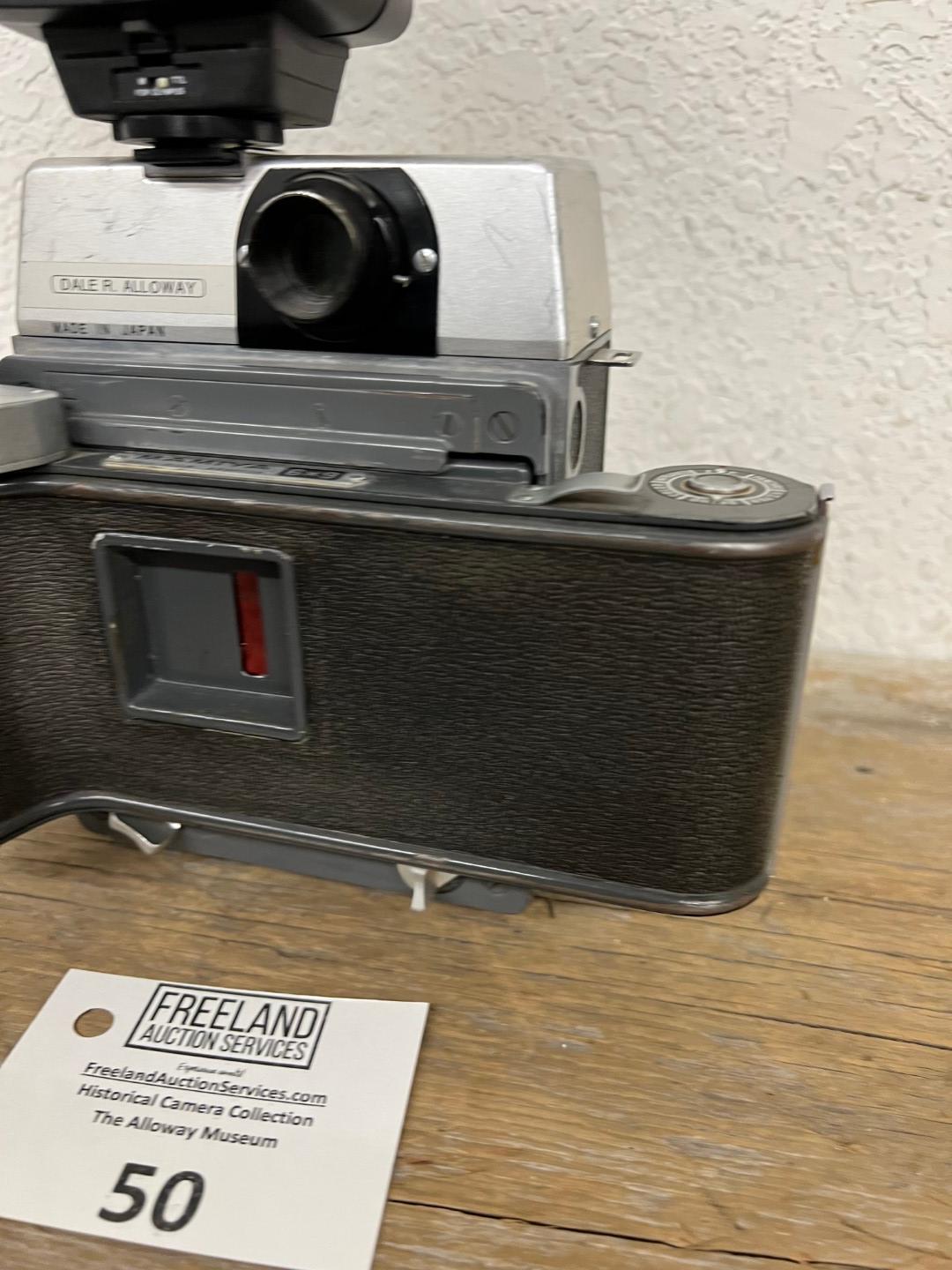 Mamiya 23 Standard Press style camera with Soligor 42 DA Flash