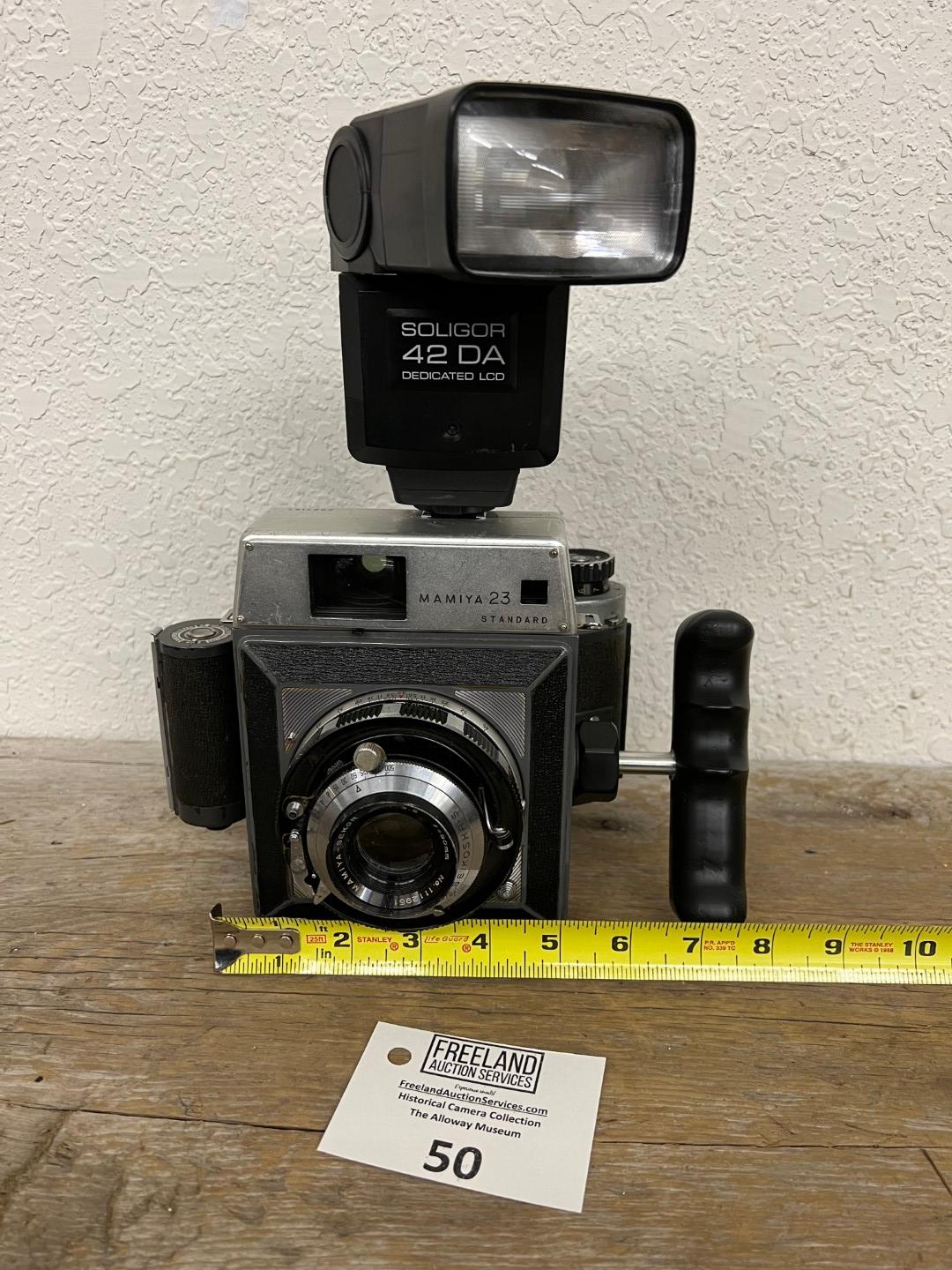 Mamiya 23 Standard Press style camera with Soligor 42 DA Flash