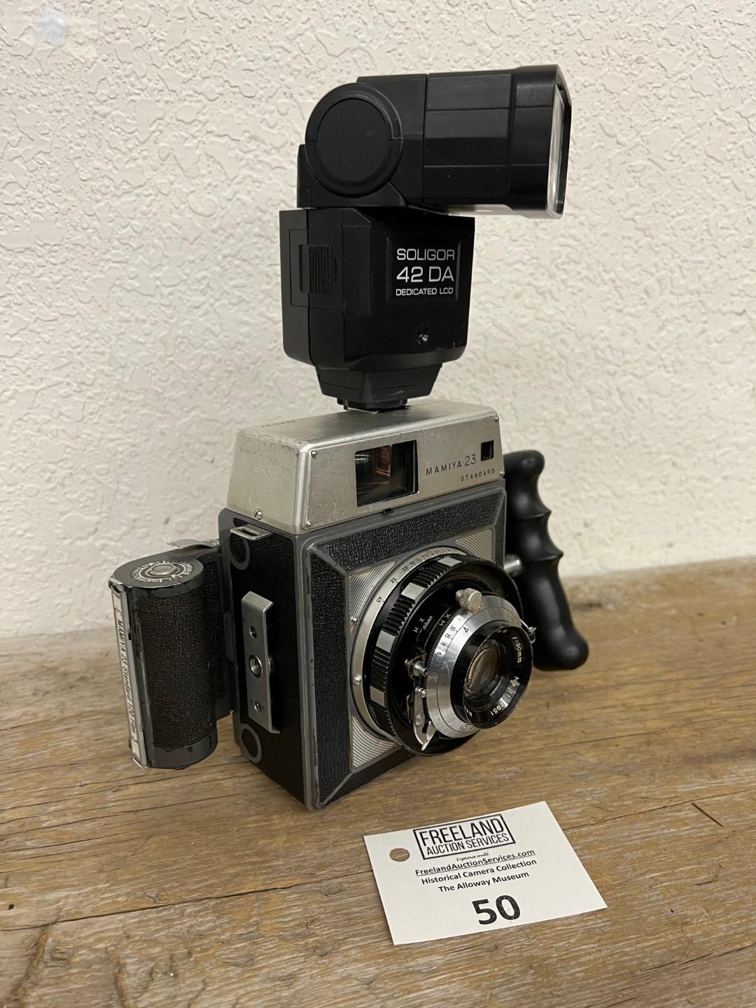 Mamiya 23 Standard Press style camera with Soligor 42 DA Flash