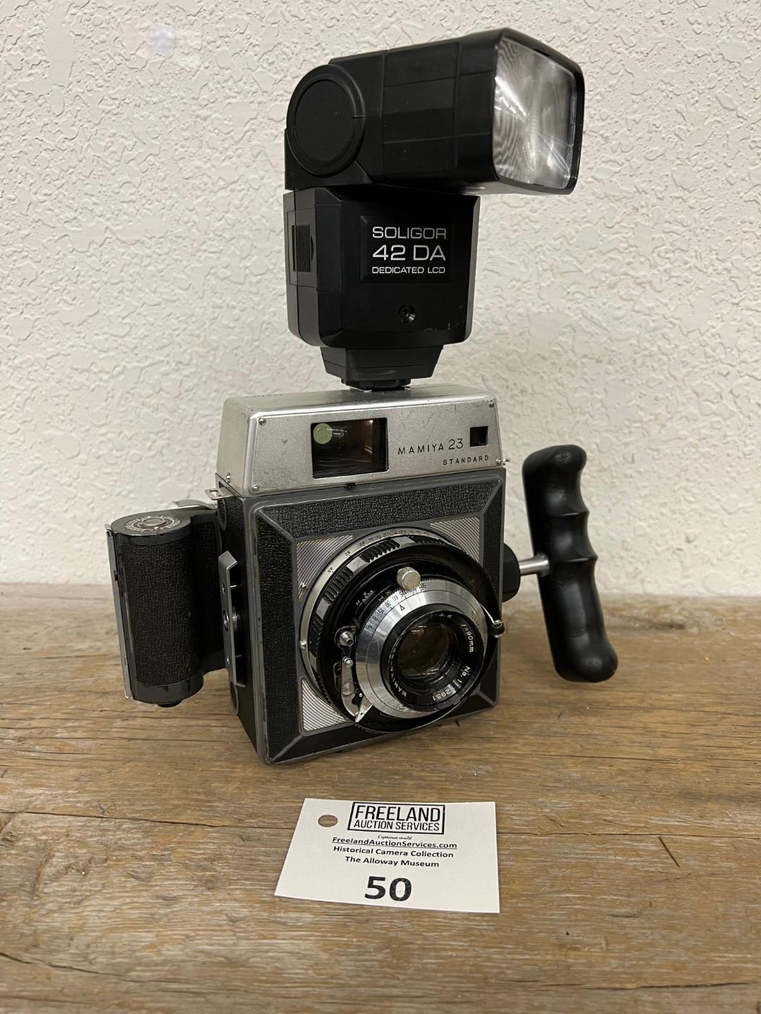 Mamiya 23 Standard Press style camera with Soligor 42 DA Flash