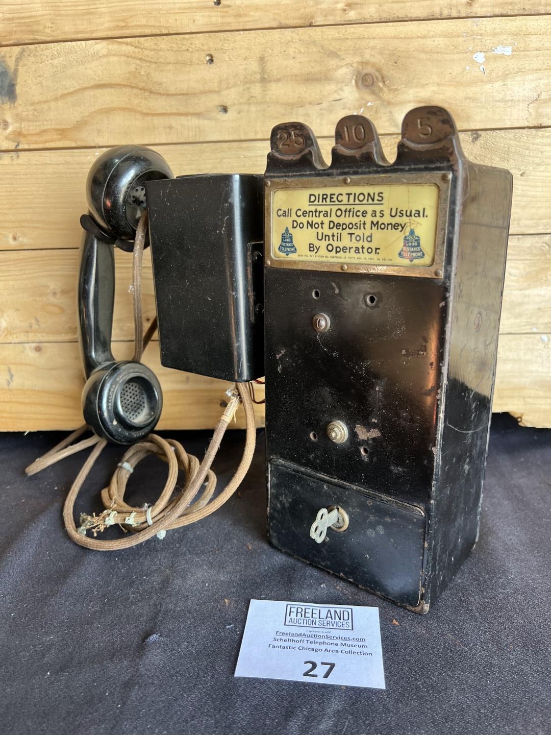 unusual Gray Paystation coin collector attached to a Kellogg Spacesaver telephone