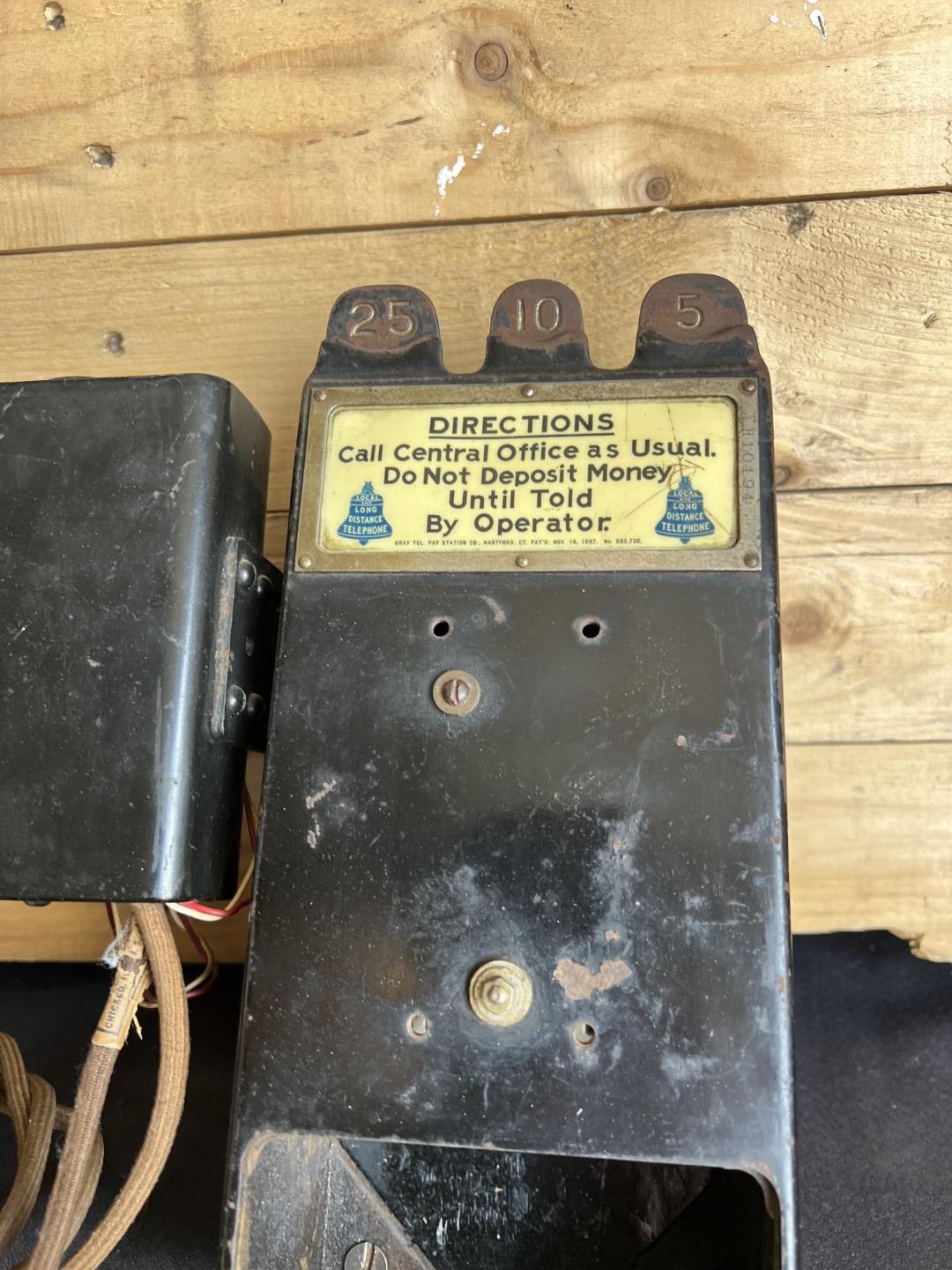 unusual Gray Paystation coin collector attached to a Kellogg Spacesaver telephone