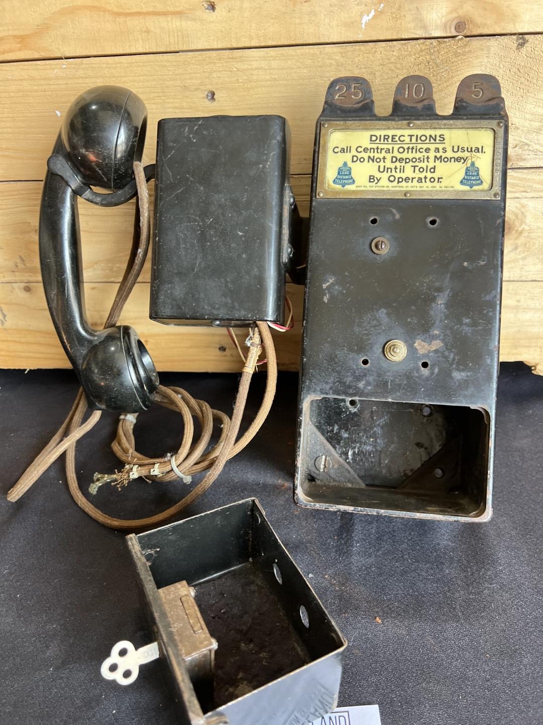 unusual Gray Paystation coin collector attached to a Kellogg Spacesaver telephone