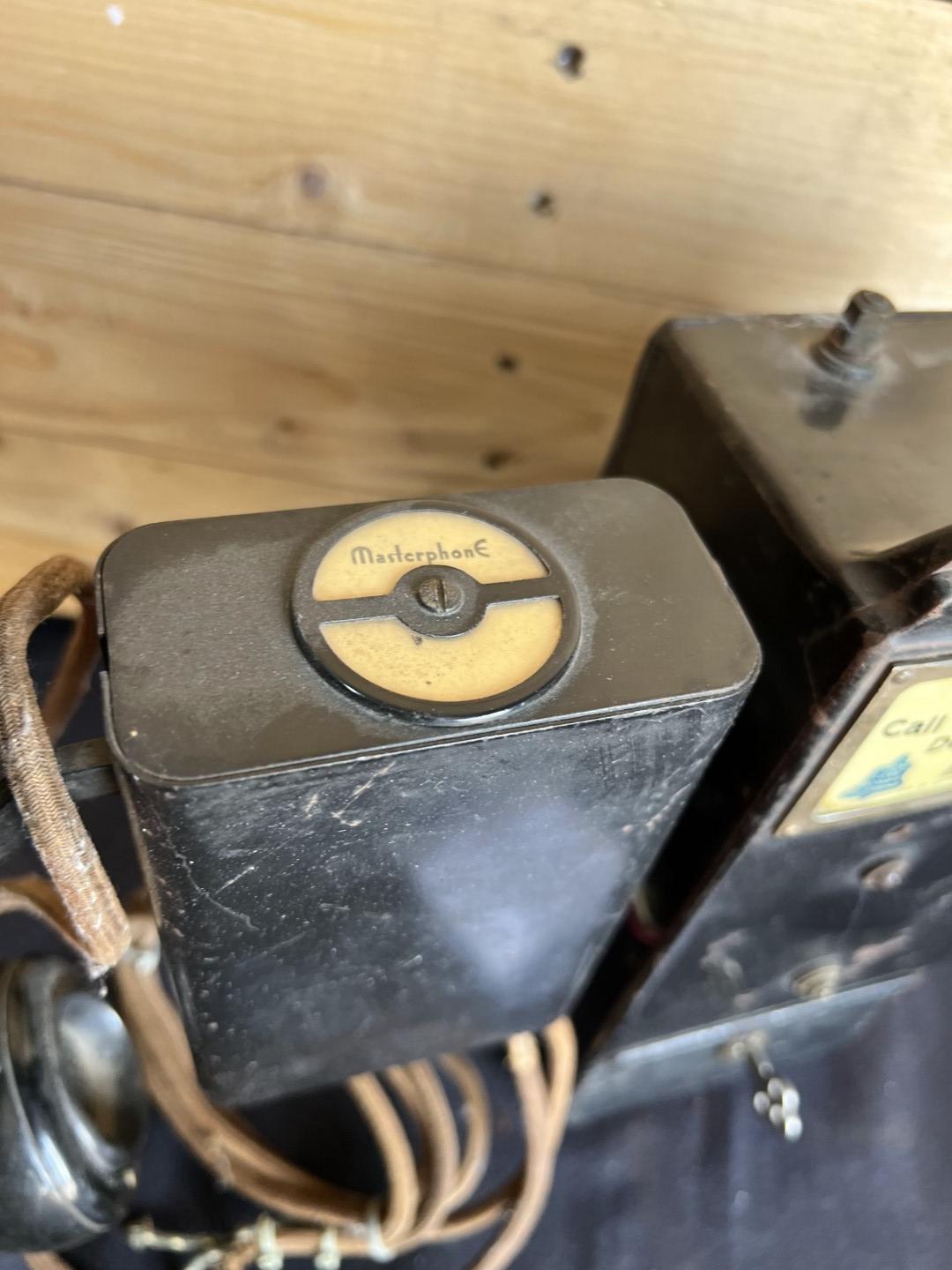 unusual Gray Paystation coin collector attached to a Kellogg Spacesaver telephone