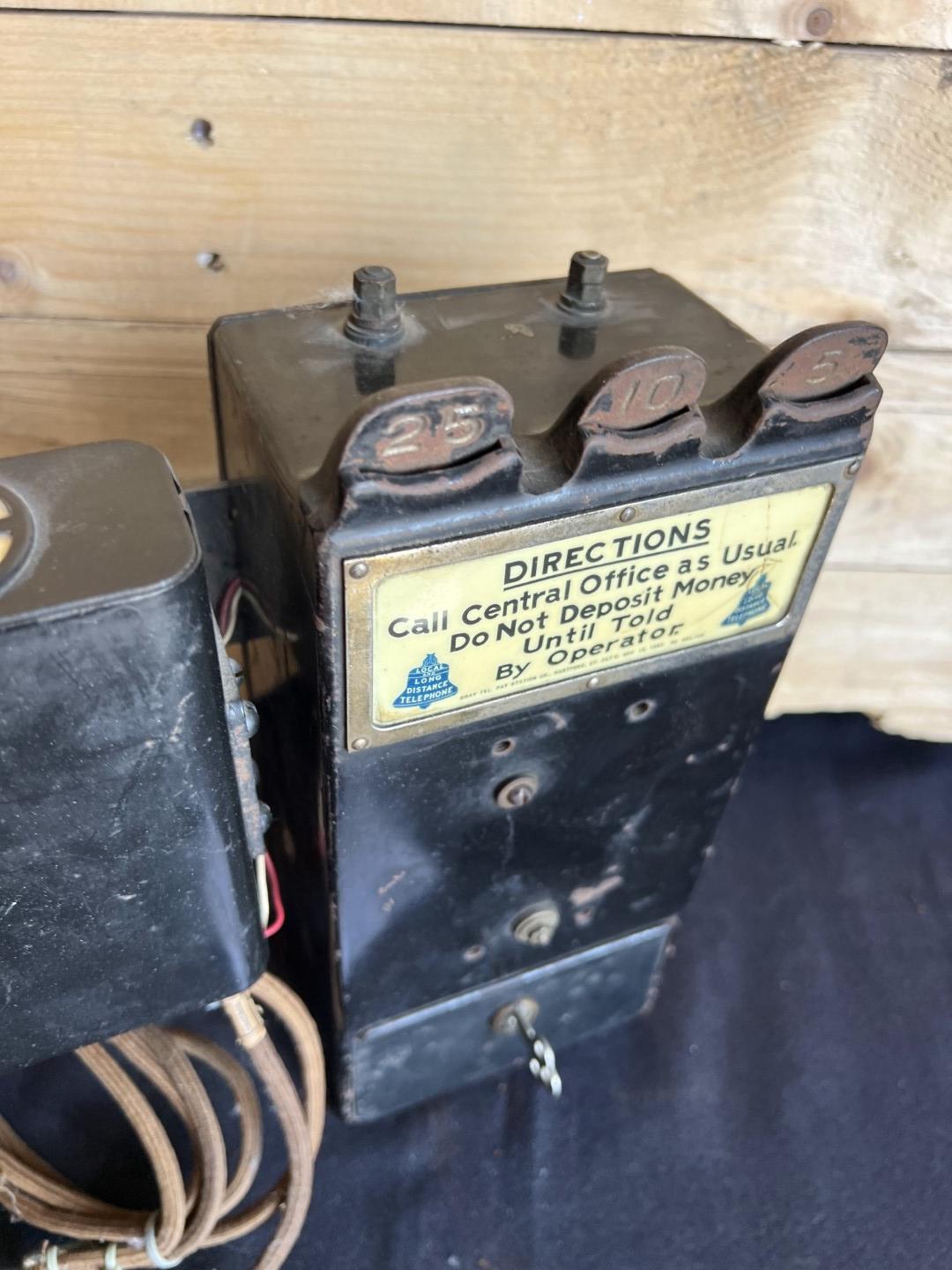 unusual Gray Paystation coin collector attached to a Kellogg Spacesaver telephone